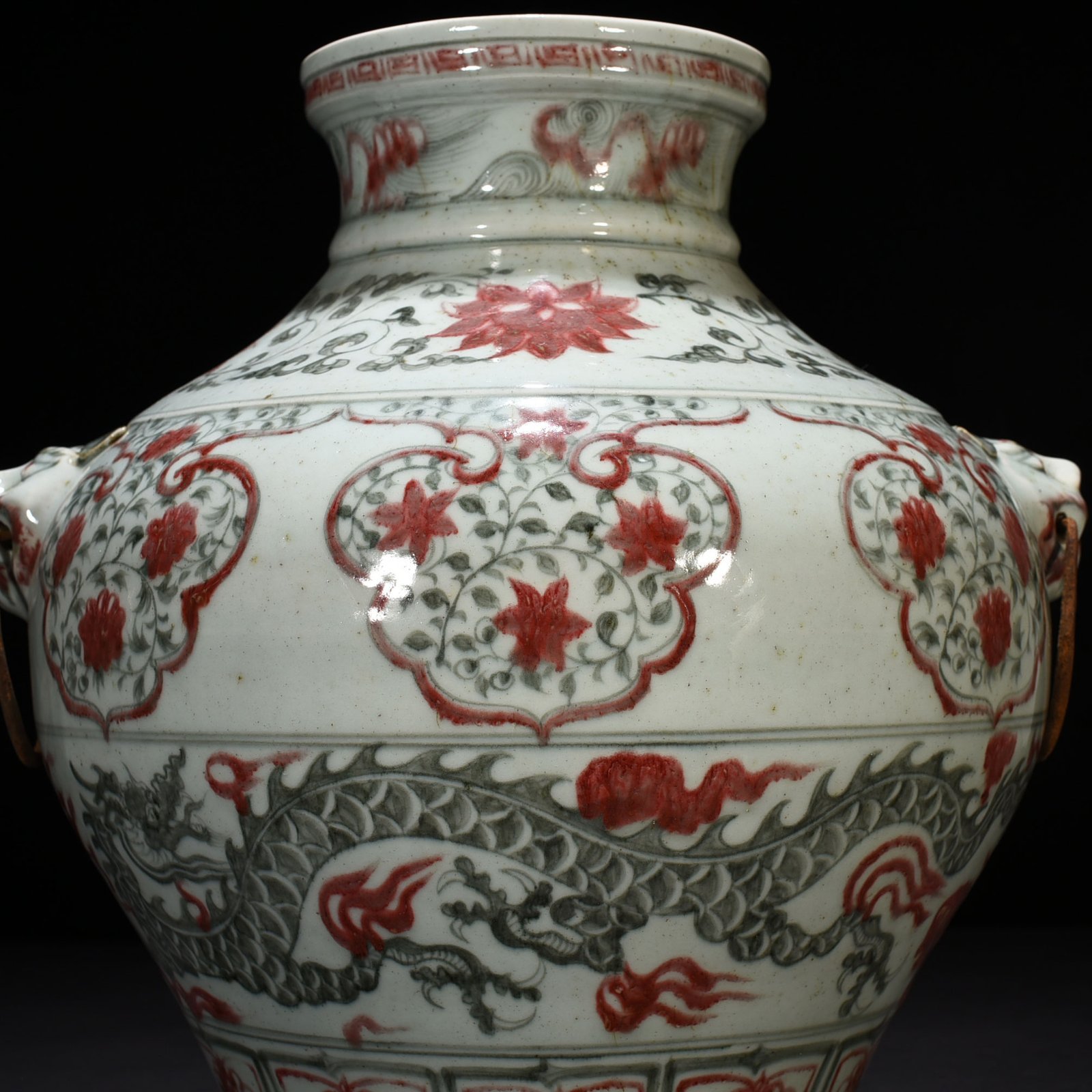 Ming Dynasty Jianwen blue and white underglaze red floral dragon pattern animal ear jar