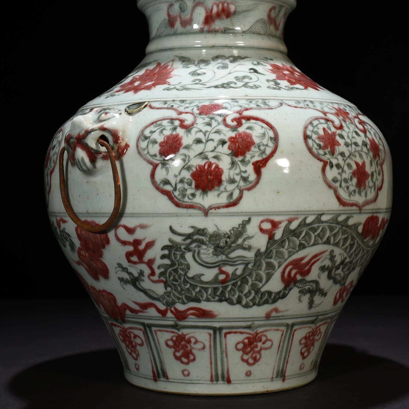 Ming Dynasty Jianwen blue and white underglaze red floral dragon pattern animal ear jar