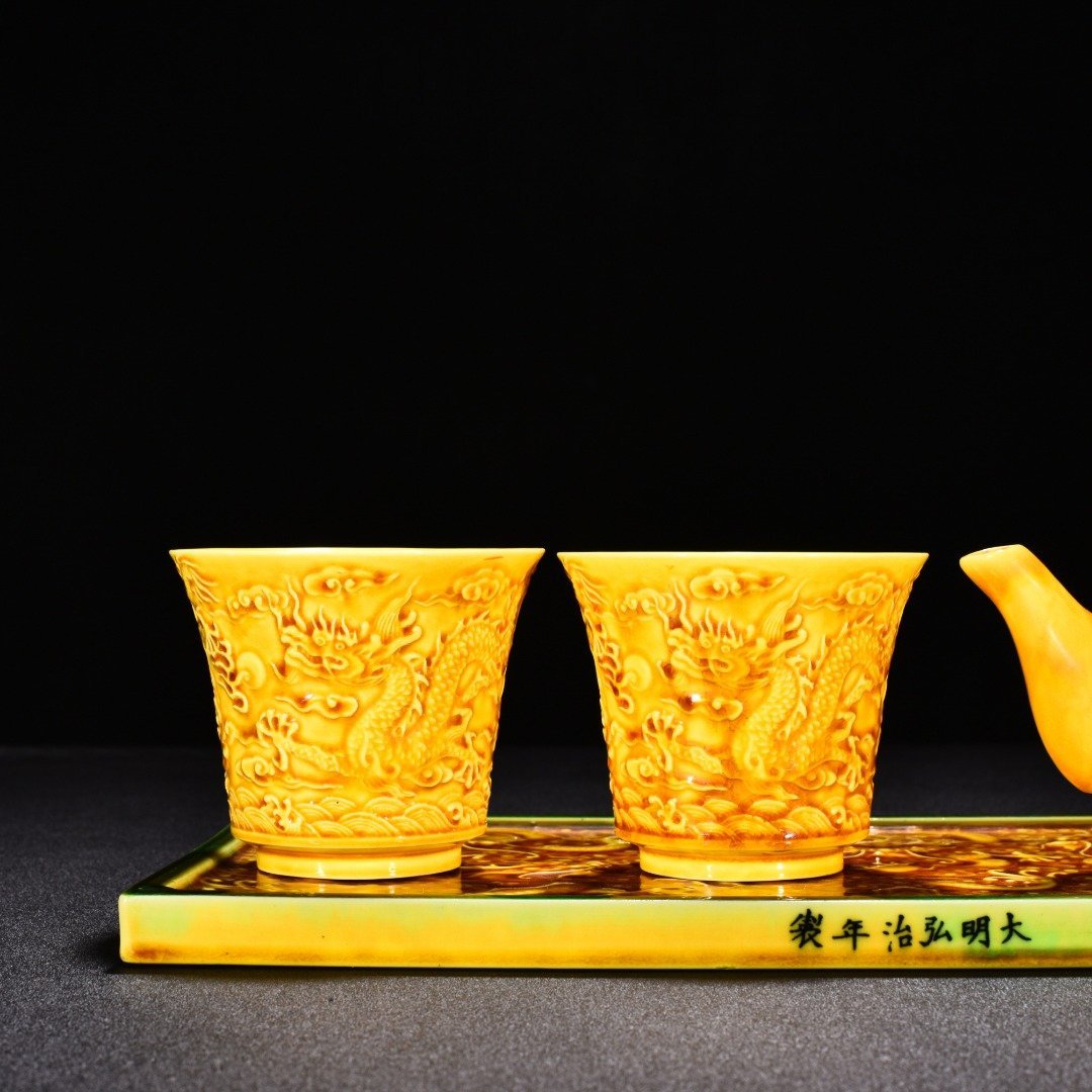 Ming Dynasty Hongzhi delicate yellow glaze nine-dragon pattern set cup