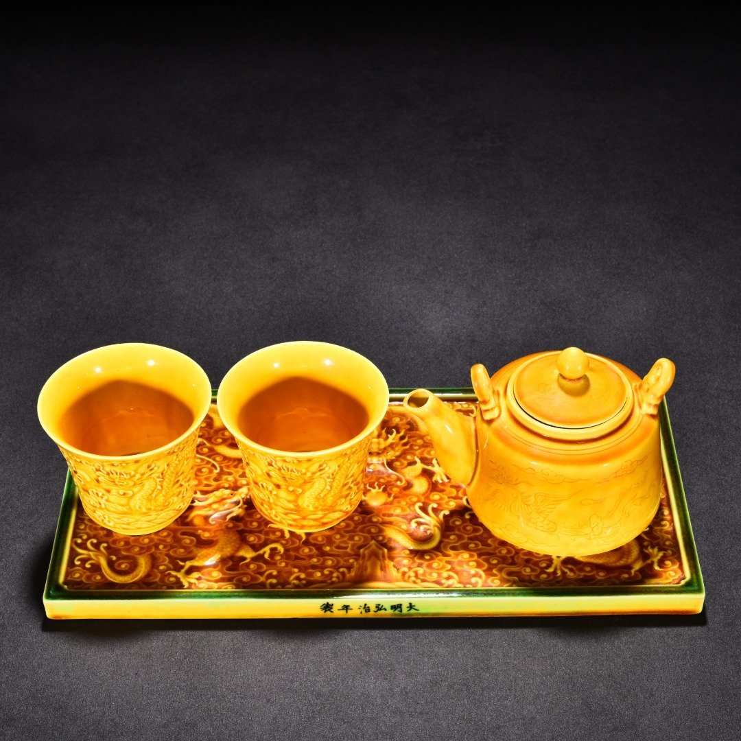 Ming Dynasty Hongzhi delicate yellow glaze nine-dragon pattern set cup