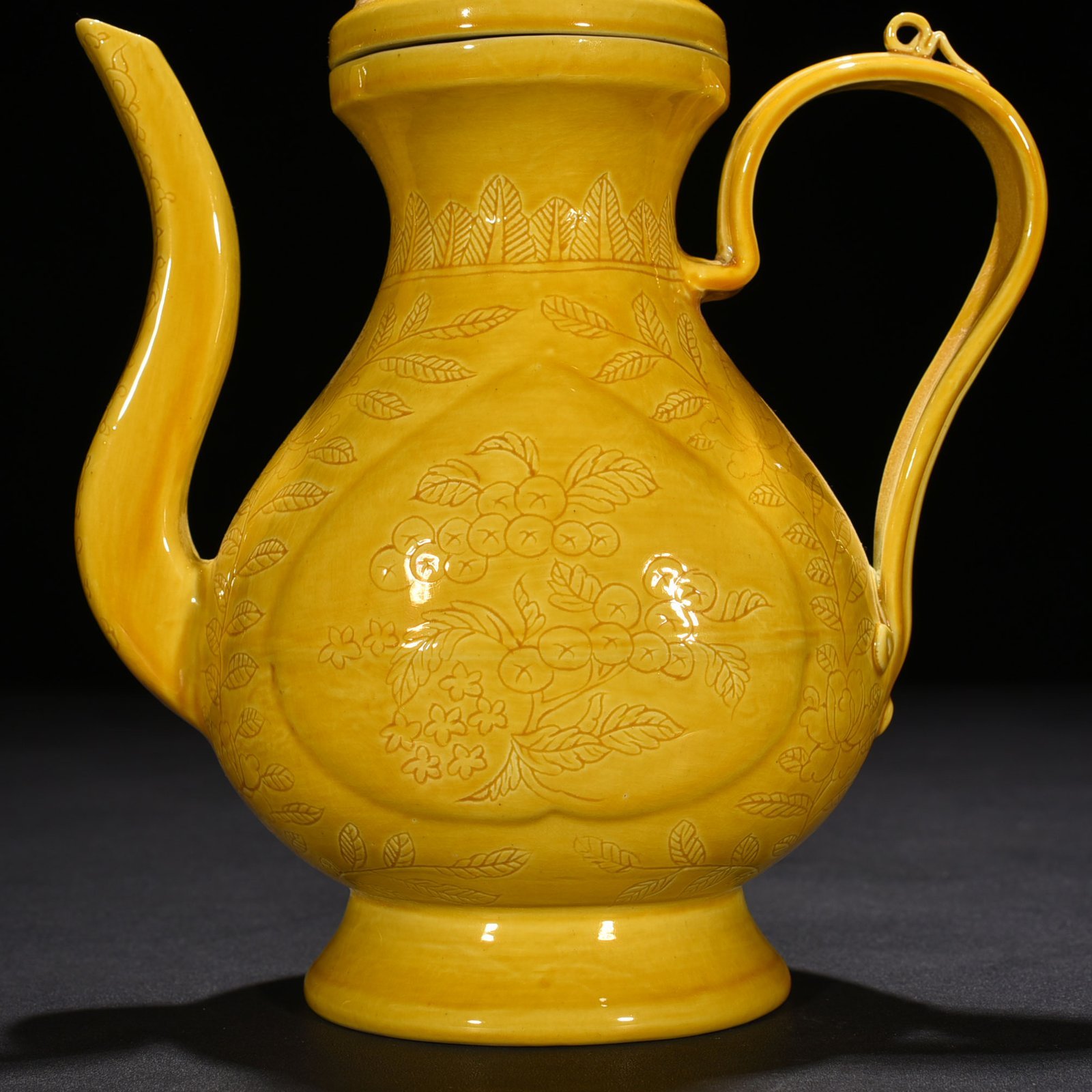 Ming Dynasty Hongzhi delicate yellow glaze engraved apricot round ewer