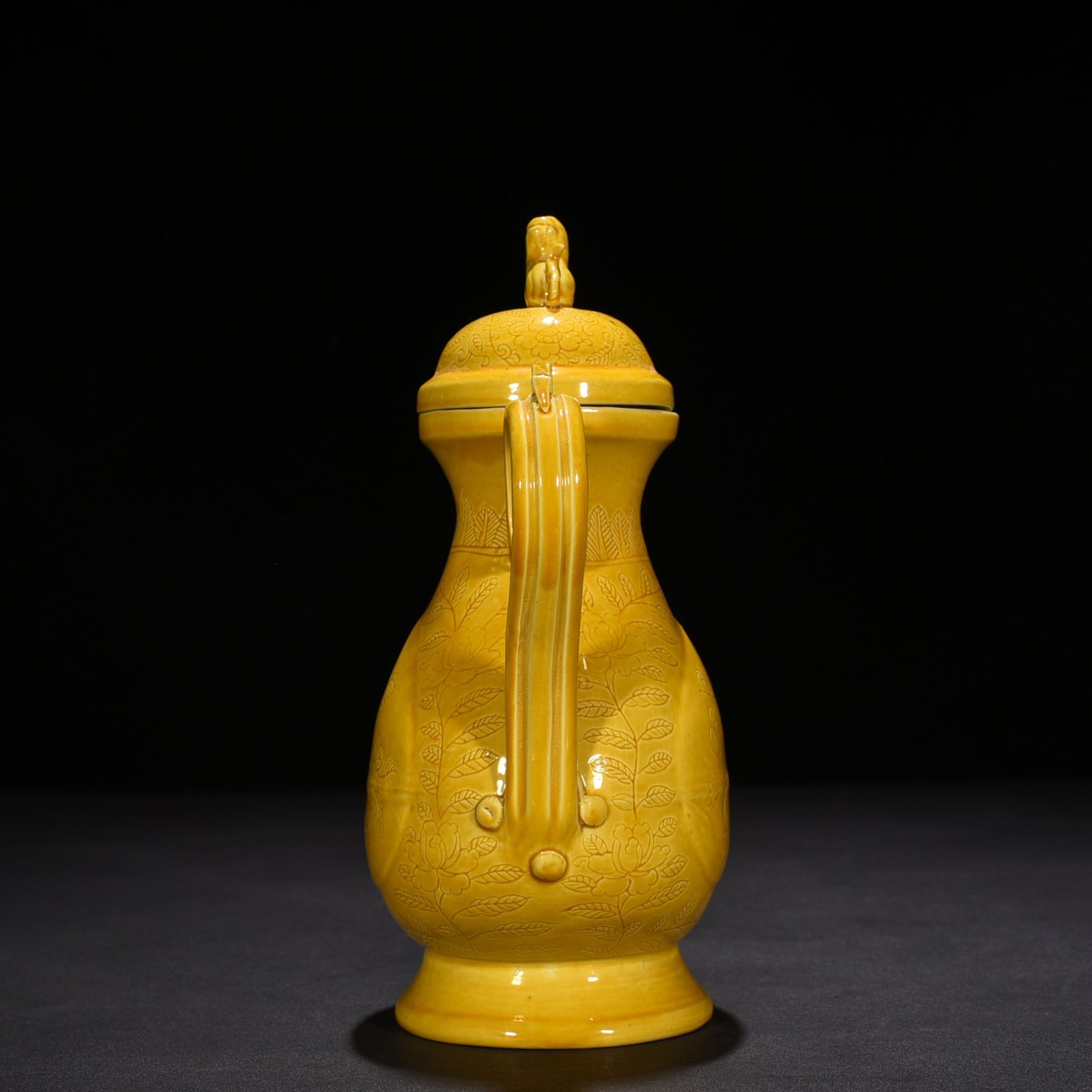 Ming Dynasty Hongzhi delicate yellow glaze engraved apricot round ewer