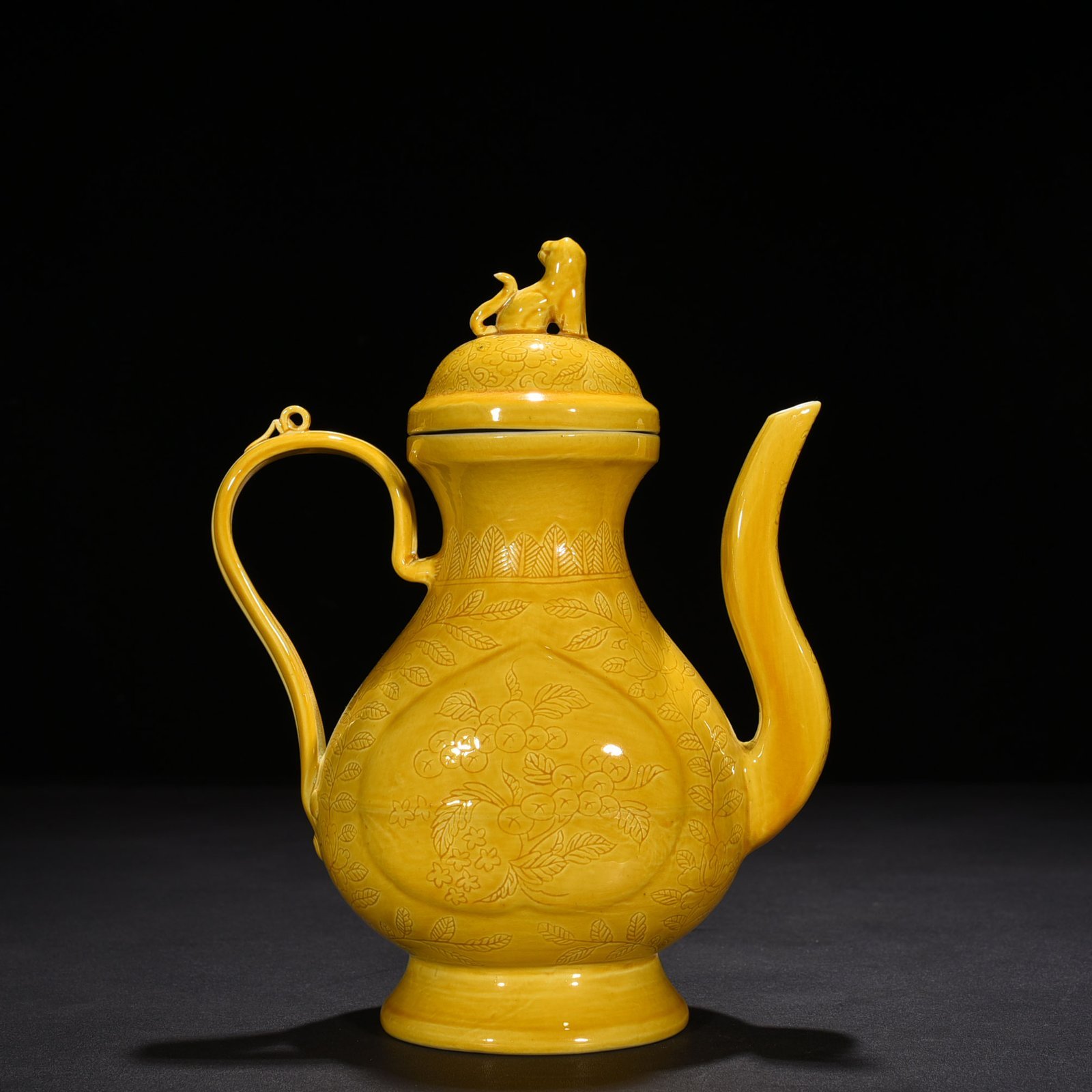 Ming Dynasty Hongzhi delicate yellow glaze engraved apricot round ewer