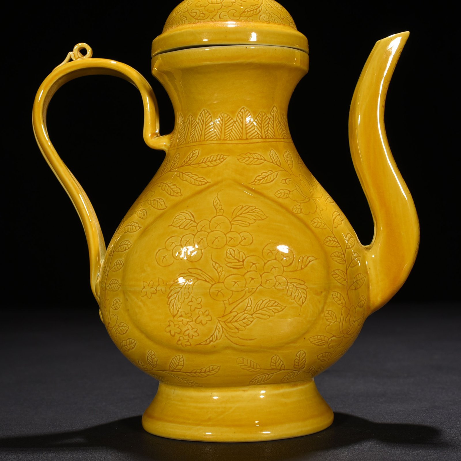 Ming Dynasty Hongzhi delicate yellow glaze engraved apricot round ewer