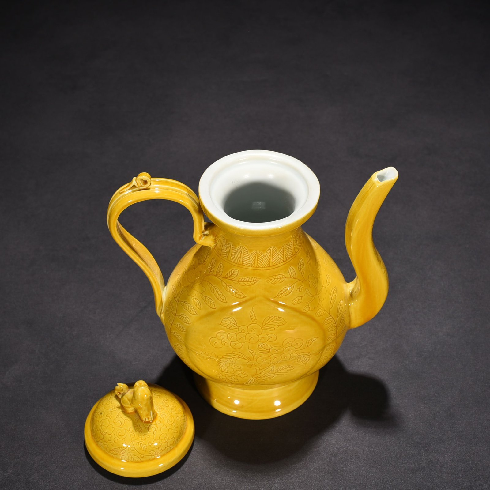 Ming Dynasty Hongzhi delicate yellow glaze engraved apricot round ewer