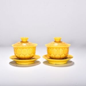 Ming Dynasty Hongzhi delicate yellow glaze lotus petal pattern three-cai bowl