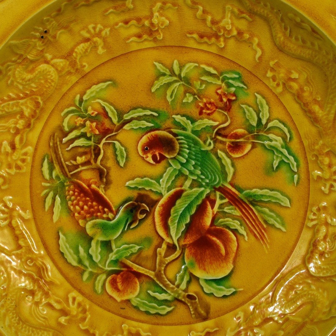 Ming Dynasty Hongzhi delicate yellow glaze carved folding branch flower and bird plate