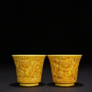 Ming Dynasty Hongzhi delicate yellow glaze carved dragon cup