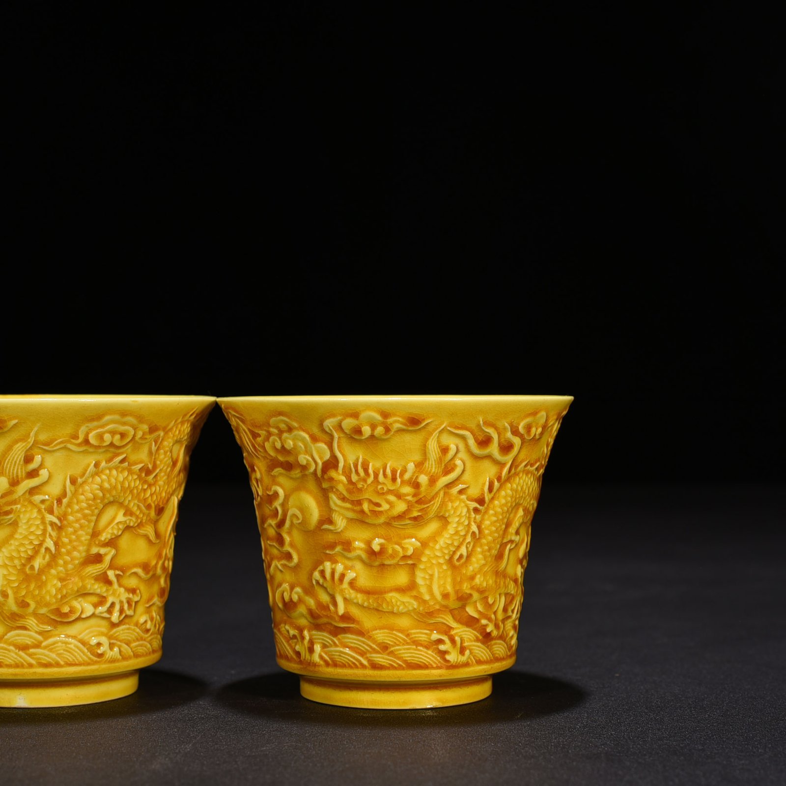 Ming Dynasty Hongzhi delicate yellow glaze carved dragon cup