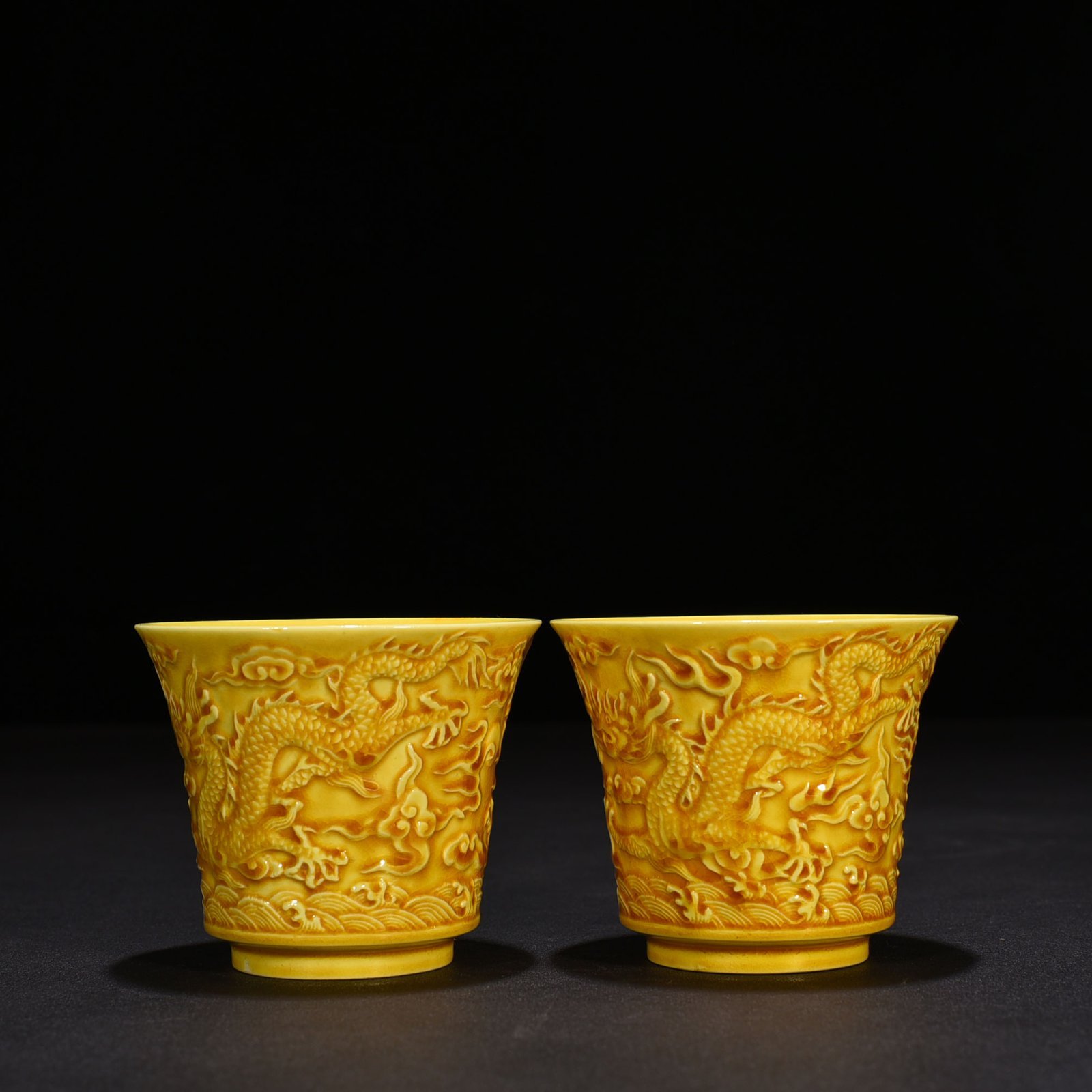 Ming Dynasty Hongzhi delicate yellow glaze carved dragon cup