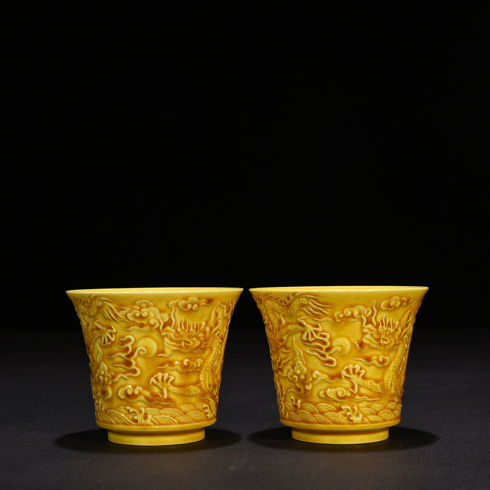 Ming Dynasty Hongzhi delicate yellow glaze carved dragon cup
