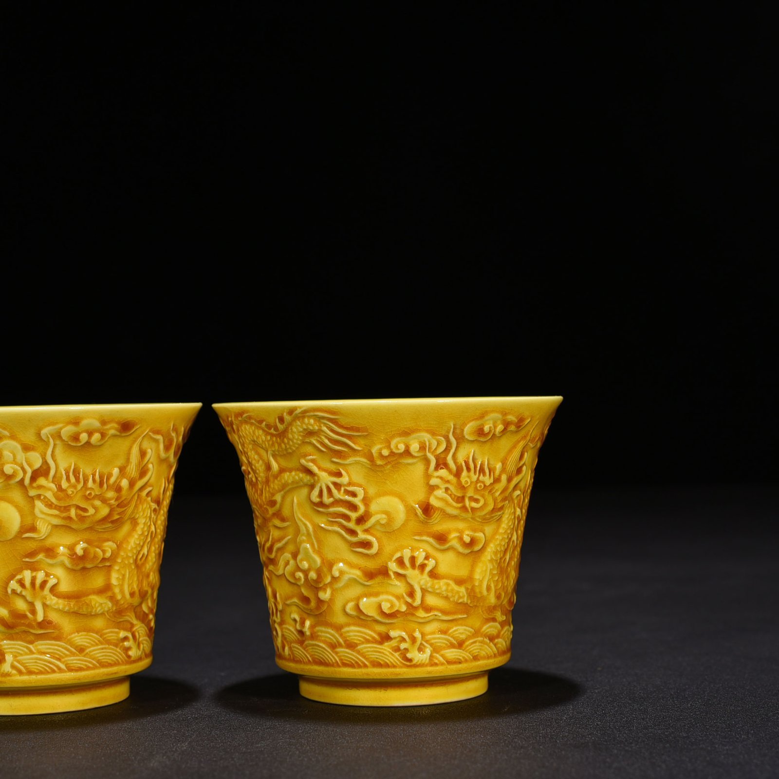 Ming Dynasty Hongzhi delicate yellow glaze carved dragon cup