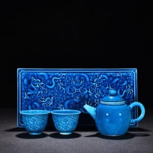 Ming Dynasty Hongzhi peacock blue glaze nine-dragon pattern set cup