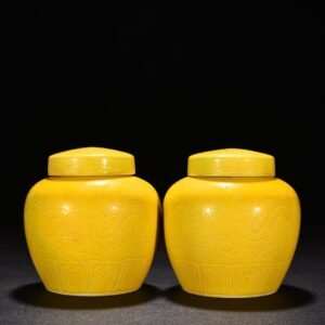 Ming Dynasty Chenghua Jiao yellow glaze engraved cloud and dragon pattern Tianzi jar
