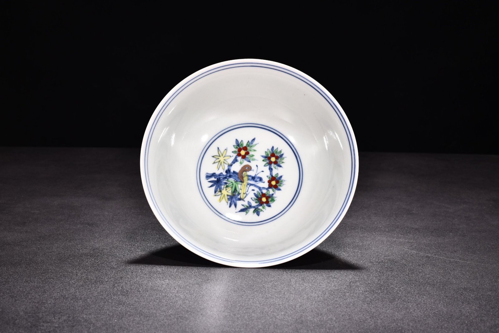 Ming Dynasty Chenghua Doucai tall bowl with purple flower and bird patterns