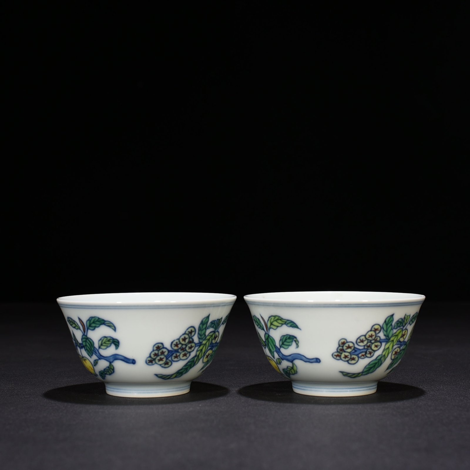 Ming Dynasty Chenghua doucai cup with folded branches flowers and fruits