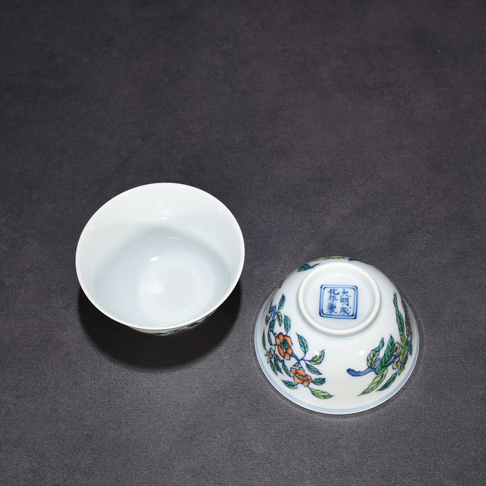 Ming Dynasty Chenghua doucai cup with folded branches flowers and fruits