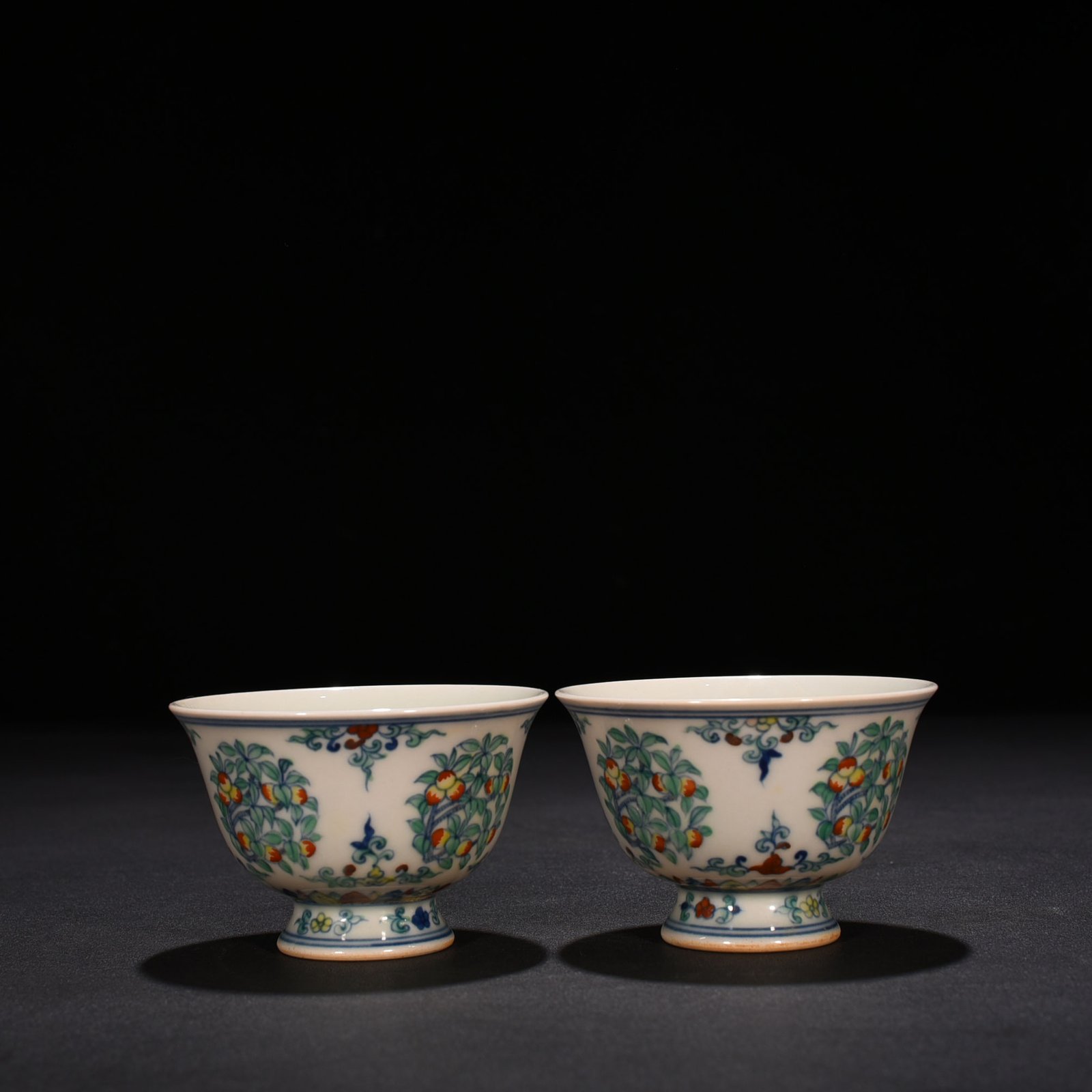 Ming Dynasty Chenghua doucai cup with folded branches flowers and fruits
