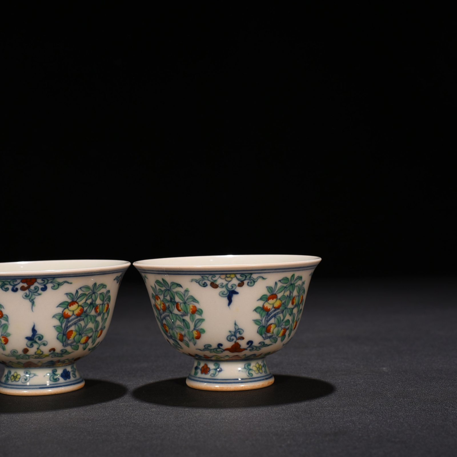 Ming Dynasty Chenghua doucai cup with folded branches flowers and fruits