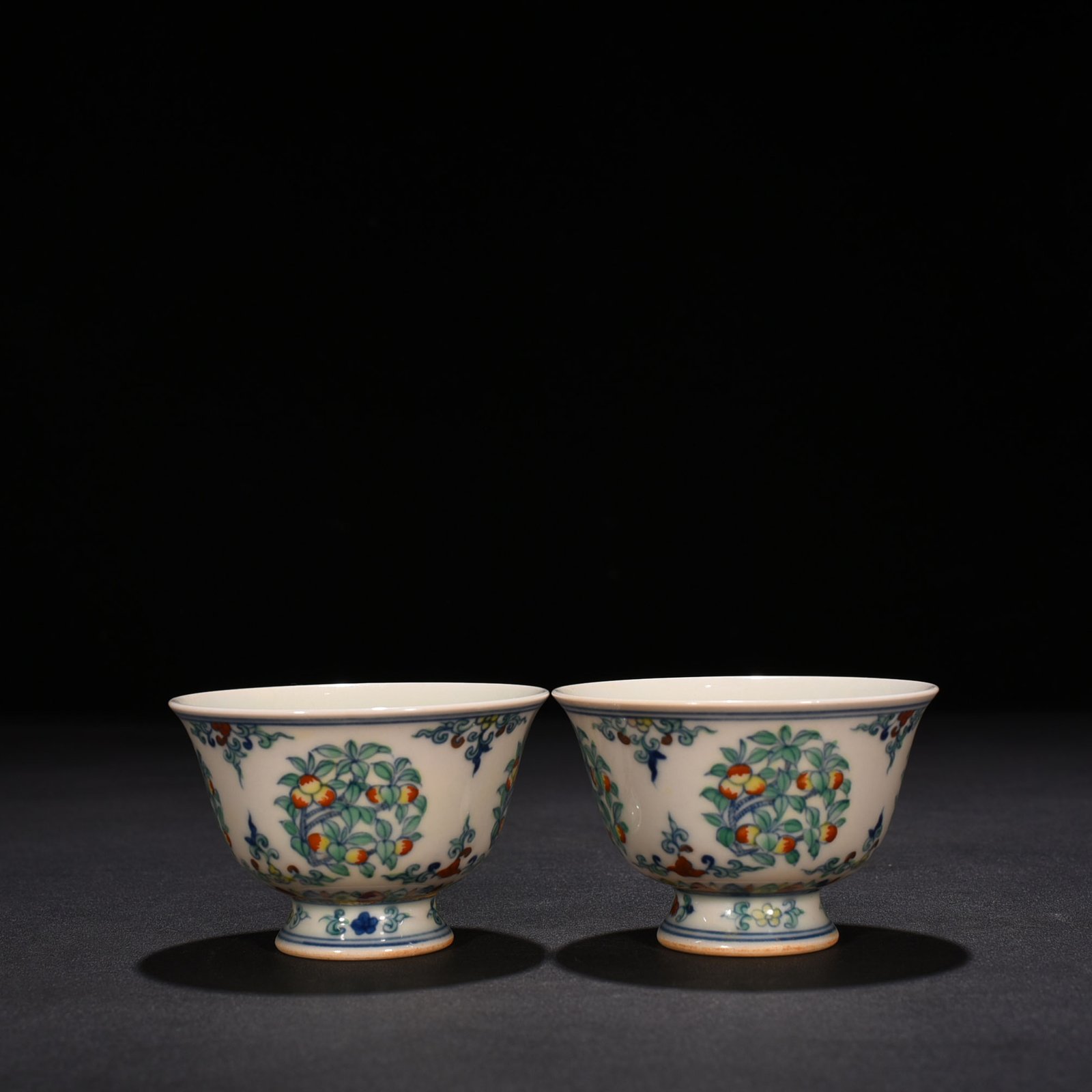 Ming Dynasty Chenghua doucai cup with folded branches flowers and fruits