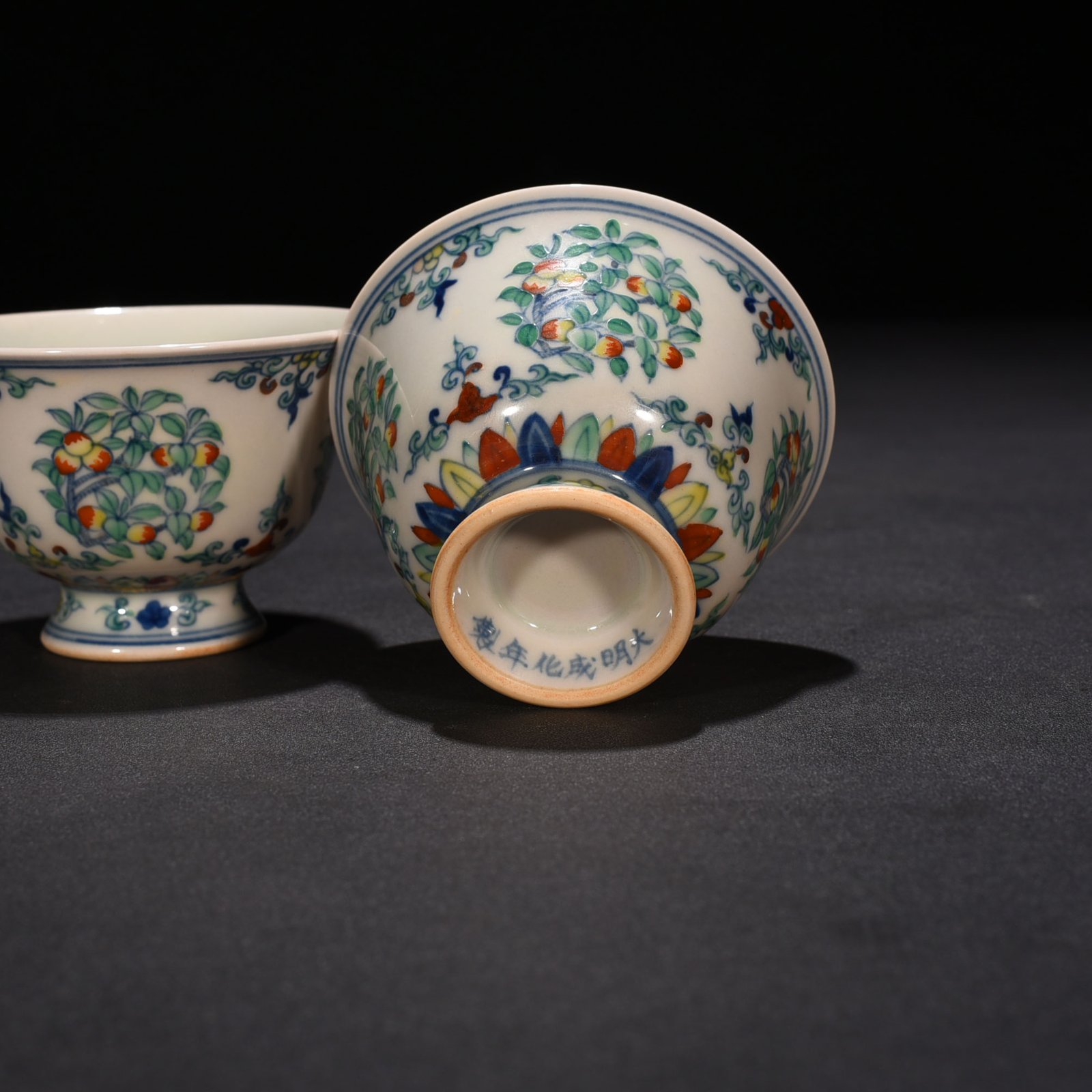 Ming Dynasty Chenghua doucai cup with folded branches flowers and fruits