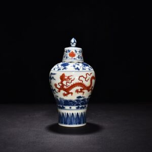 Ming Dynasty Chenghua alum red blue and white seawater dragon plum vase
