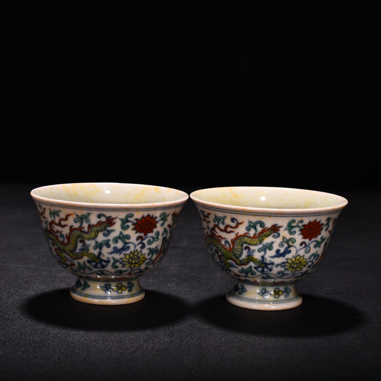 Ming Dynasty Chenghua red body cup with colorful purple clouds and dragon