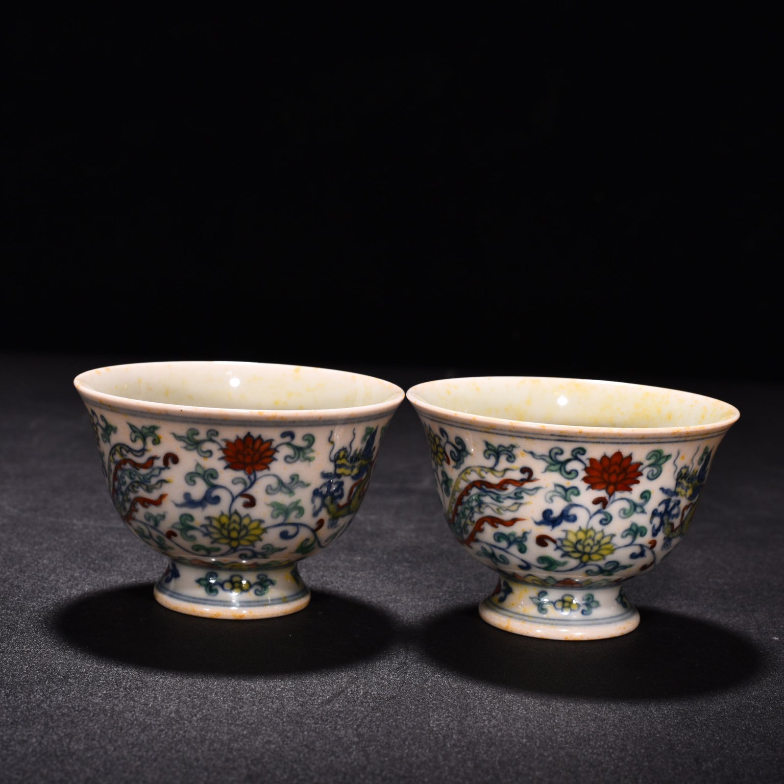 Ming Dynasty Chenghua red body cup with colorful purple clouds and dragon