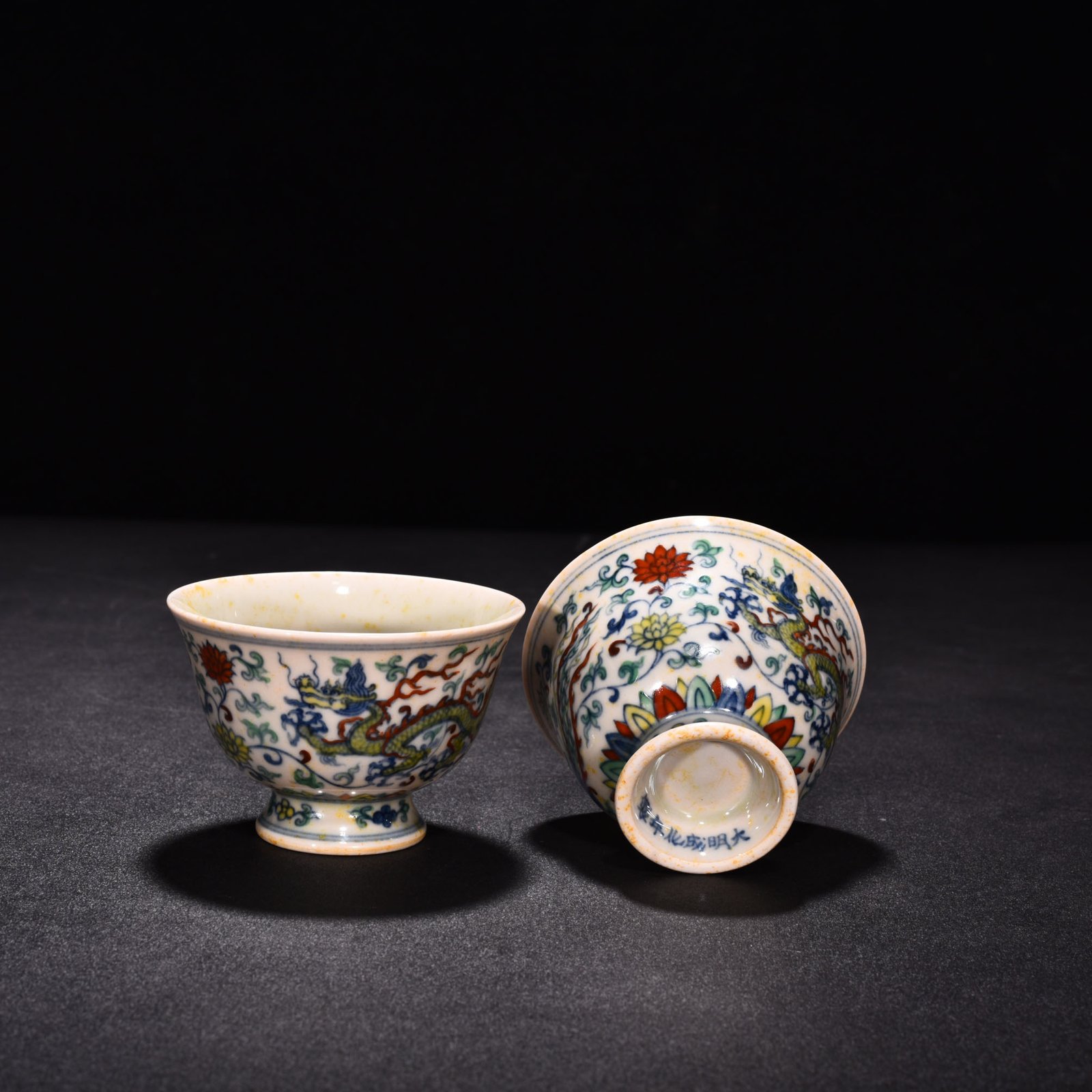 Ming Dynasty Chenghua red body cup with colorful purple clouds and dragon