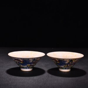 Ming Dynasty Chenghua red-bodied bucket hat with colorful purple peacock