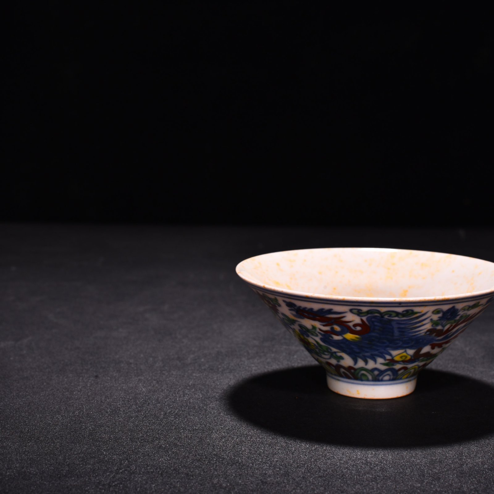 Ming Dynasty Chenghua red-bodied bucket hat with colorful purple peacock