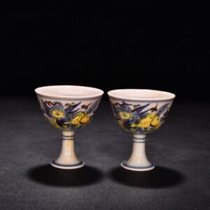 Ming Dynasty Chenghua red body cup with colorful purple sea beasts