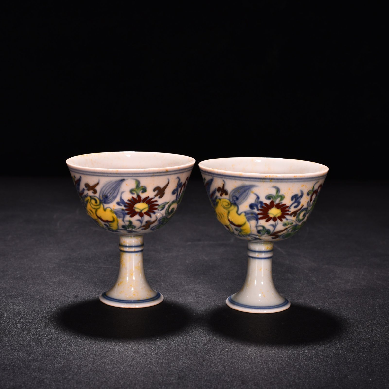 Ming Dynasty Chenghua red body cup with colorful purple sea beasts