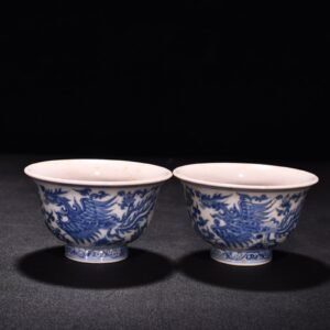 Ming Dynasty Chenghua red-bodied blue and white phoenix pressed hand cup