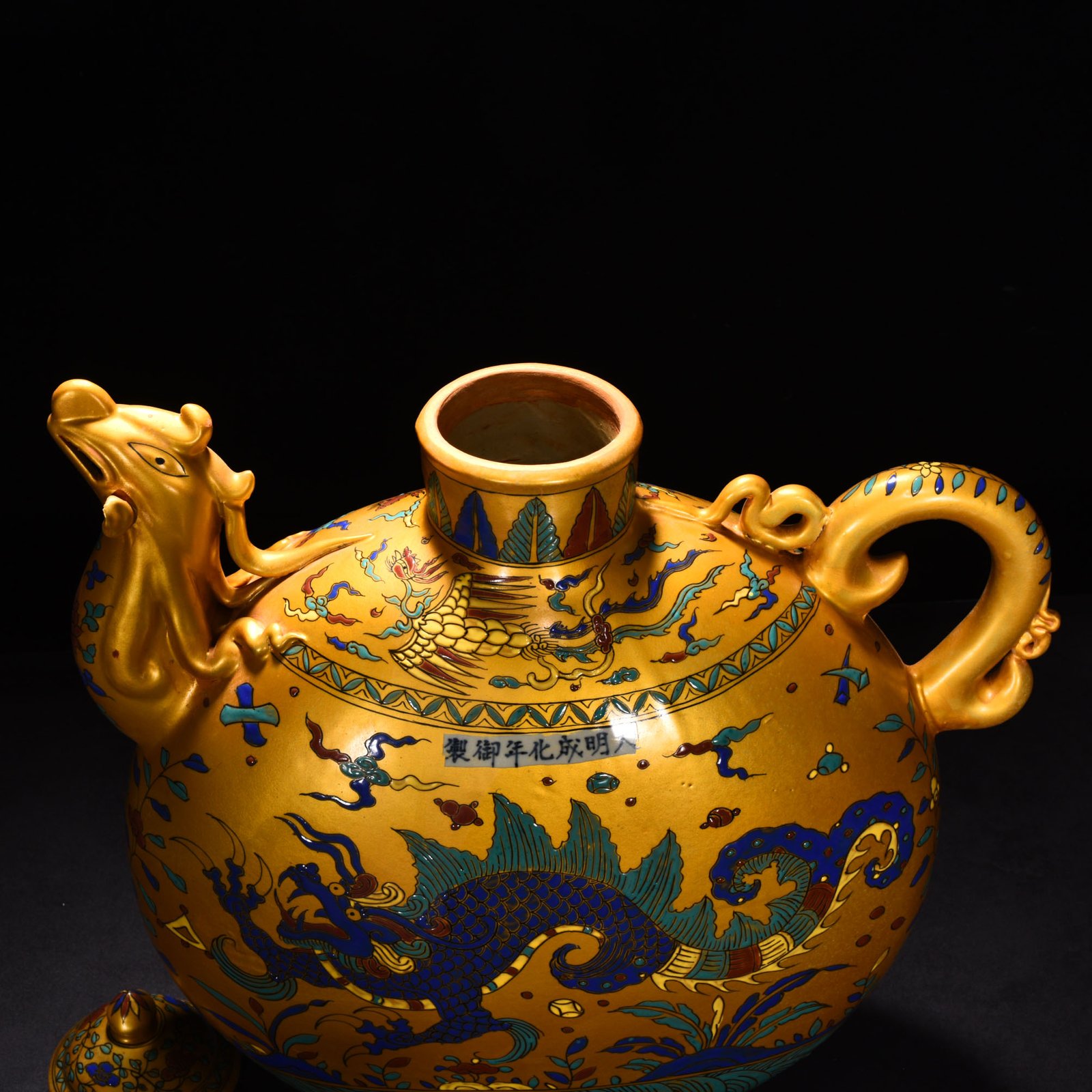 Ming Dynasty Chenghua Jindi multicolored fish dragon and phoenix head pot
