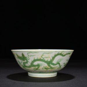Ming Dynasty Chenghua carved seawater green dragon bowl