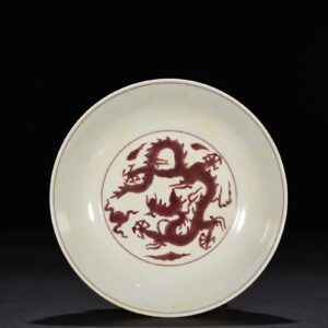 Ming Dynasty Chenghua carved purple dragon plate