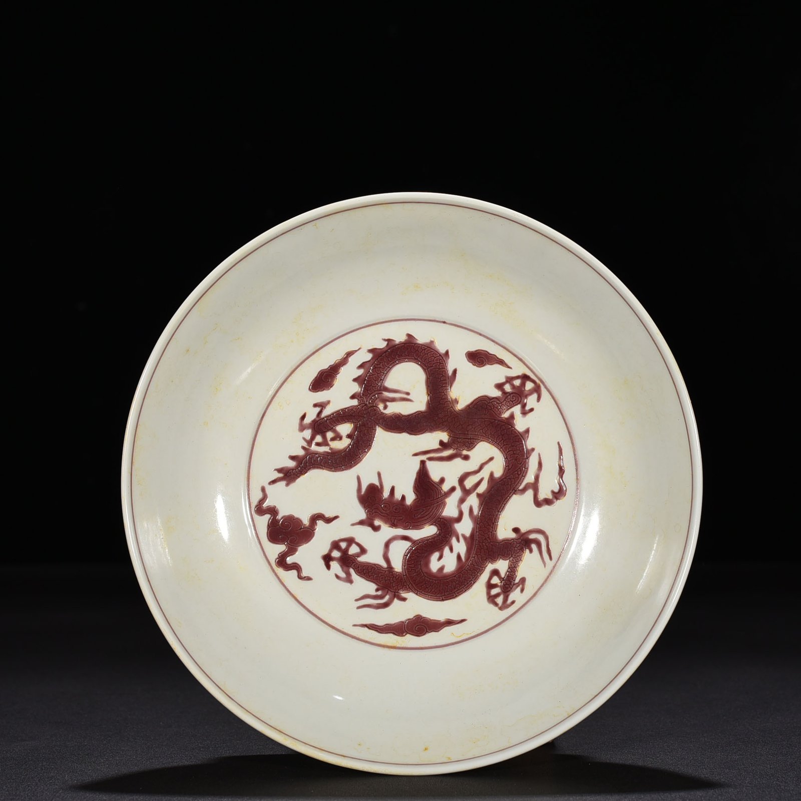 Ming Dynasty Chenghua carved purple dragon plate