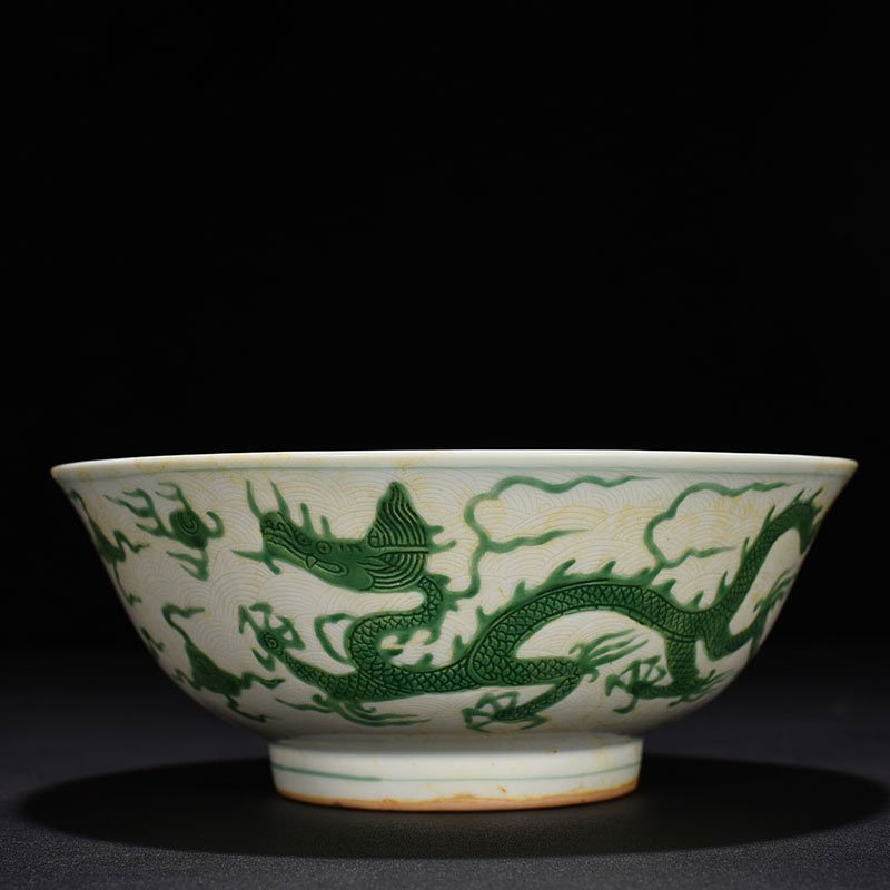 Ming Dynasty Chenghua carved green dragon bowl