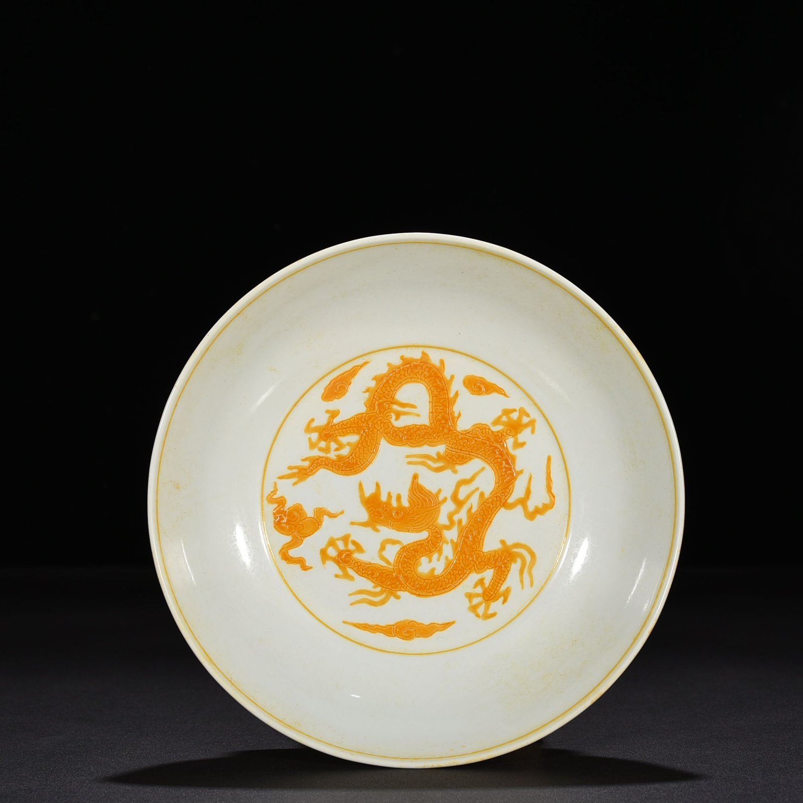 Ming Dynasty Chenghua carved yellow dragon plate