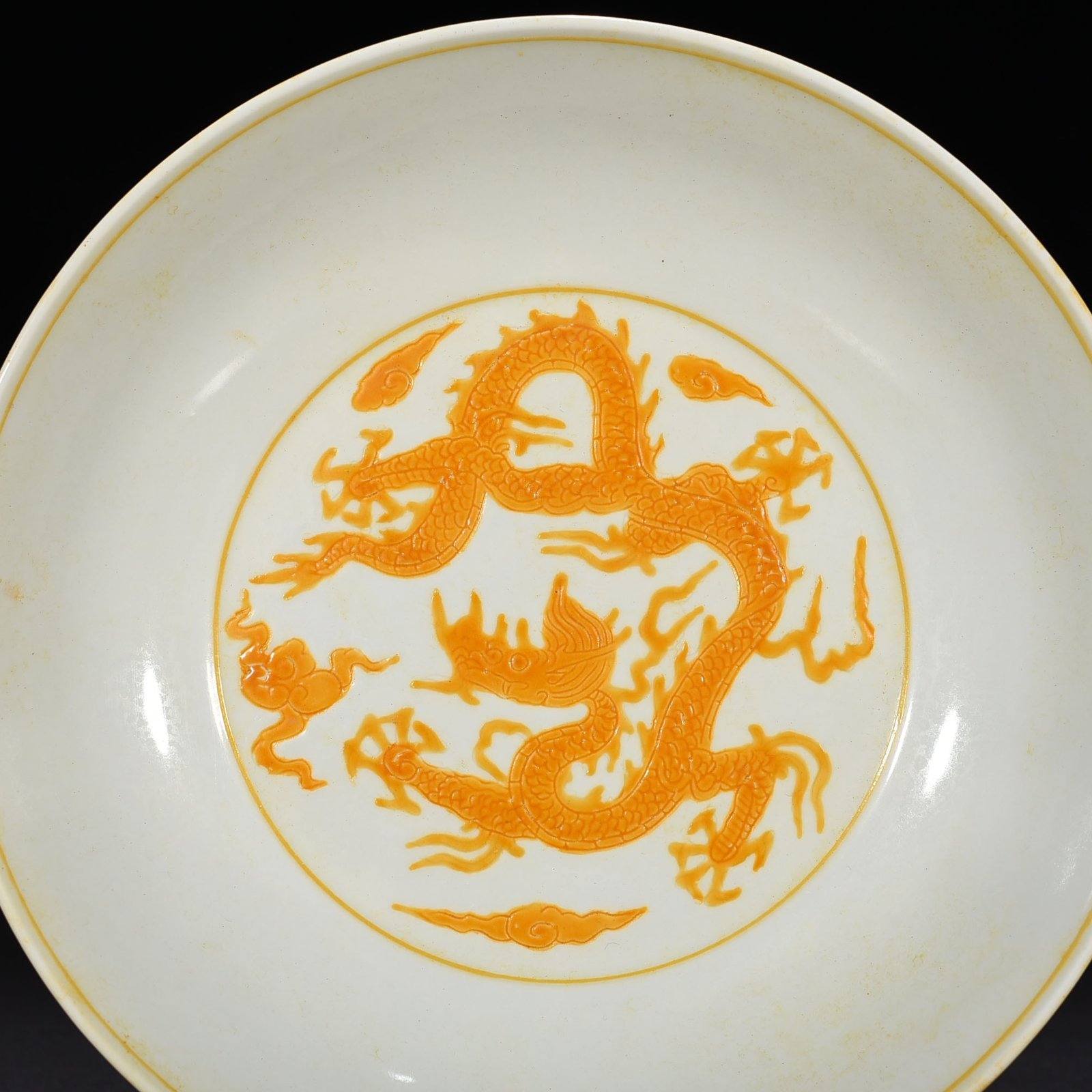 Ming Dynasty Chenghua carved yellow dragon plate