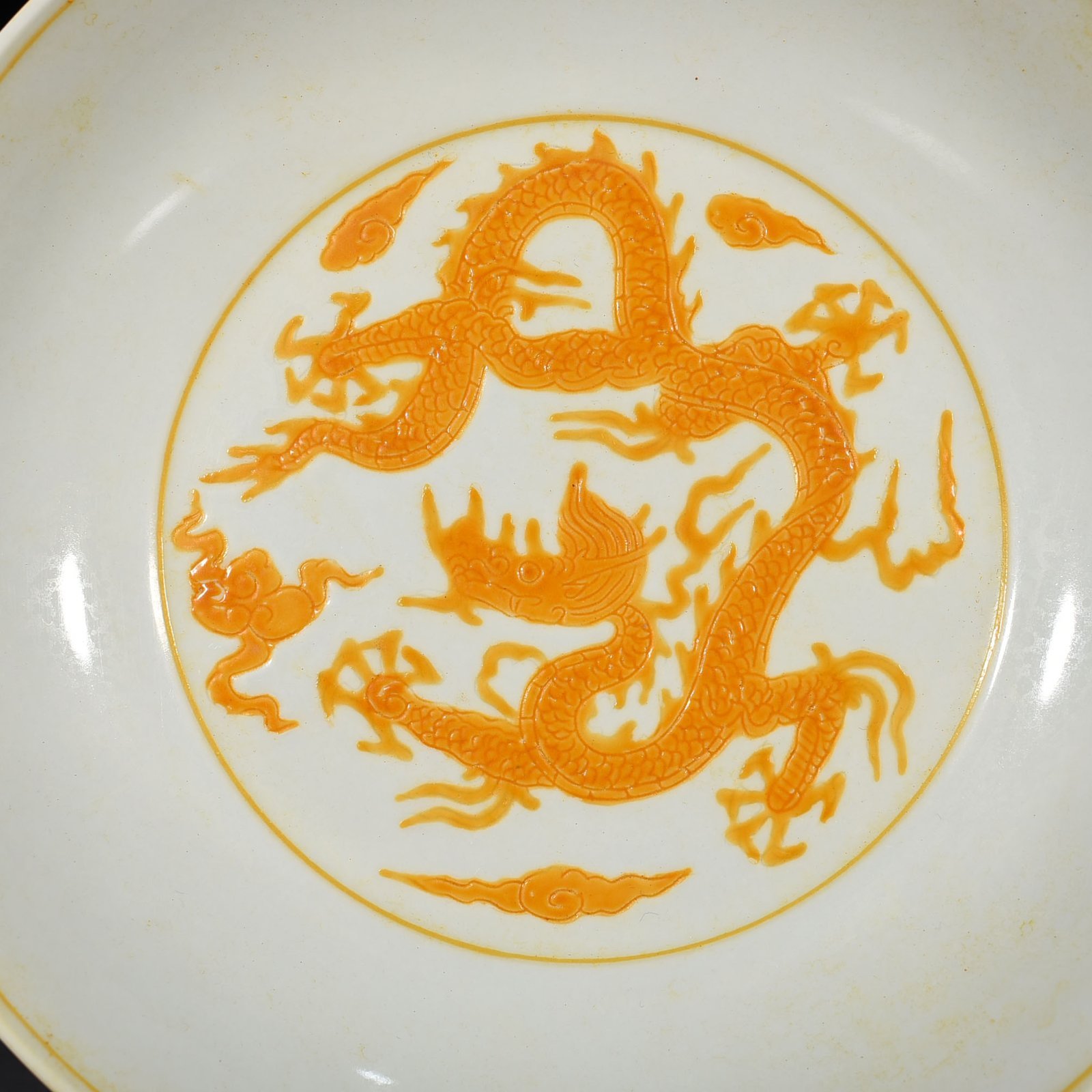 Ming Dynasty Chenghua carved yellow dragon plate