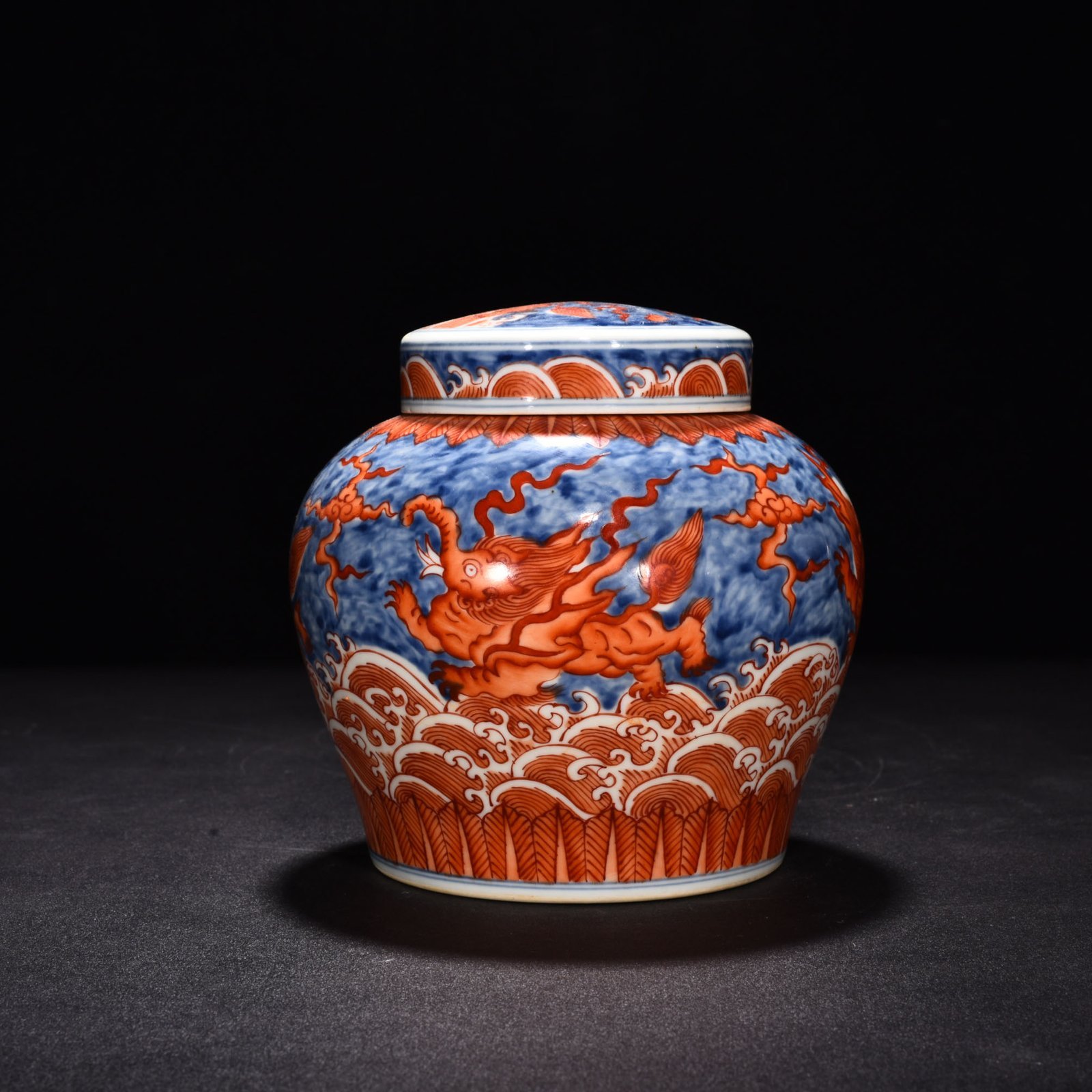 Ming Dynasty Chenghua blue and white alum red sea animal flying elephant lid jar