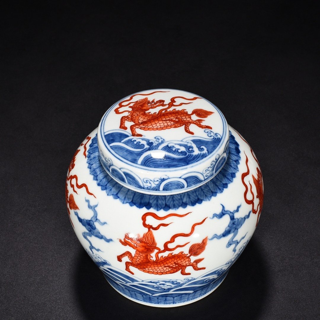 Ming Dynasty Chenghua blue and white alum red unicorn lid jar