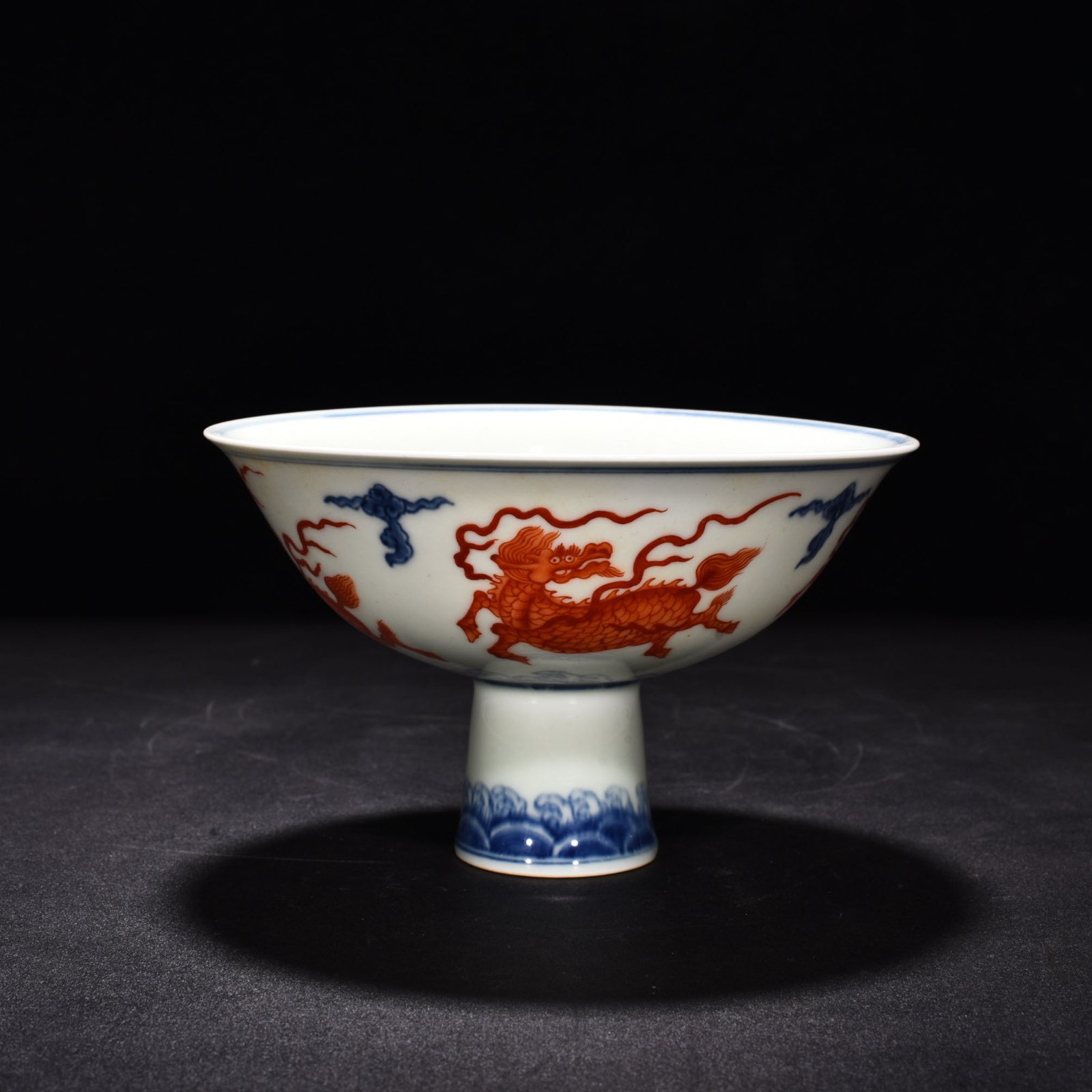 Ming Dynasty Chenghua blue and white alum red unicorn tall bowl