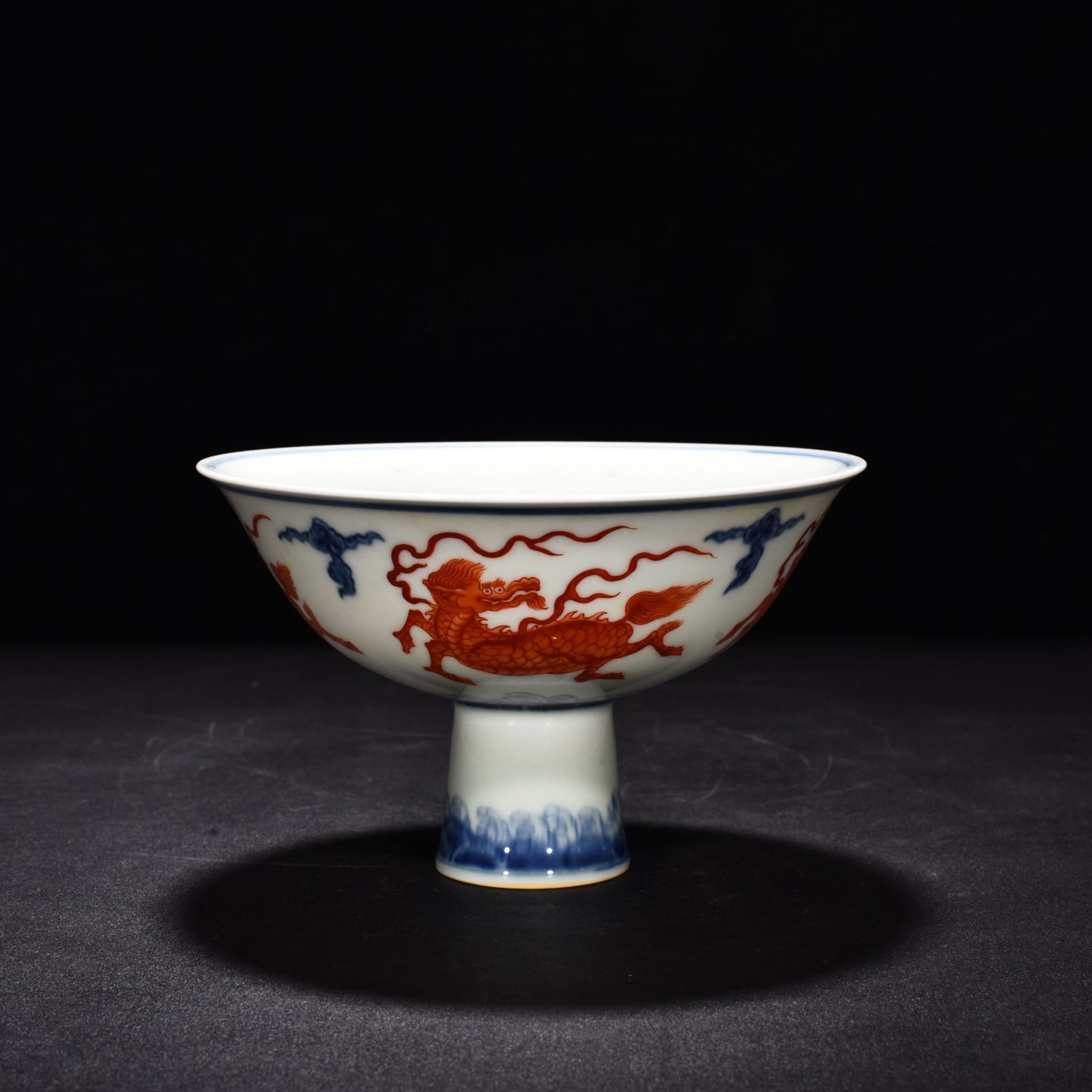 Ming Dynasty Chenghua blue and white alum red unicorn tall bowl
