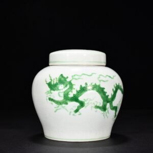 Ming Dynasty Zhengde green glaze cover jar with dark engraved cloud and dragon