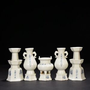 Ming Dynasty Yongle ninth year sweet white glaze five offerings candlestick