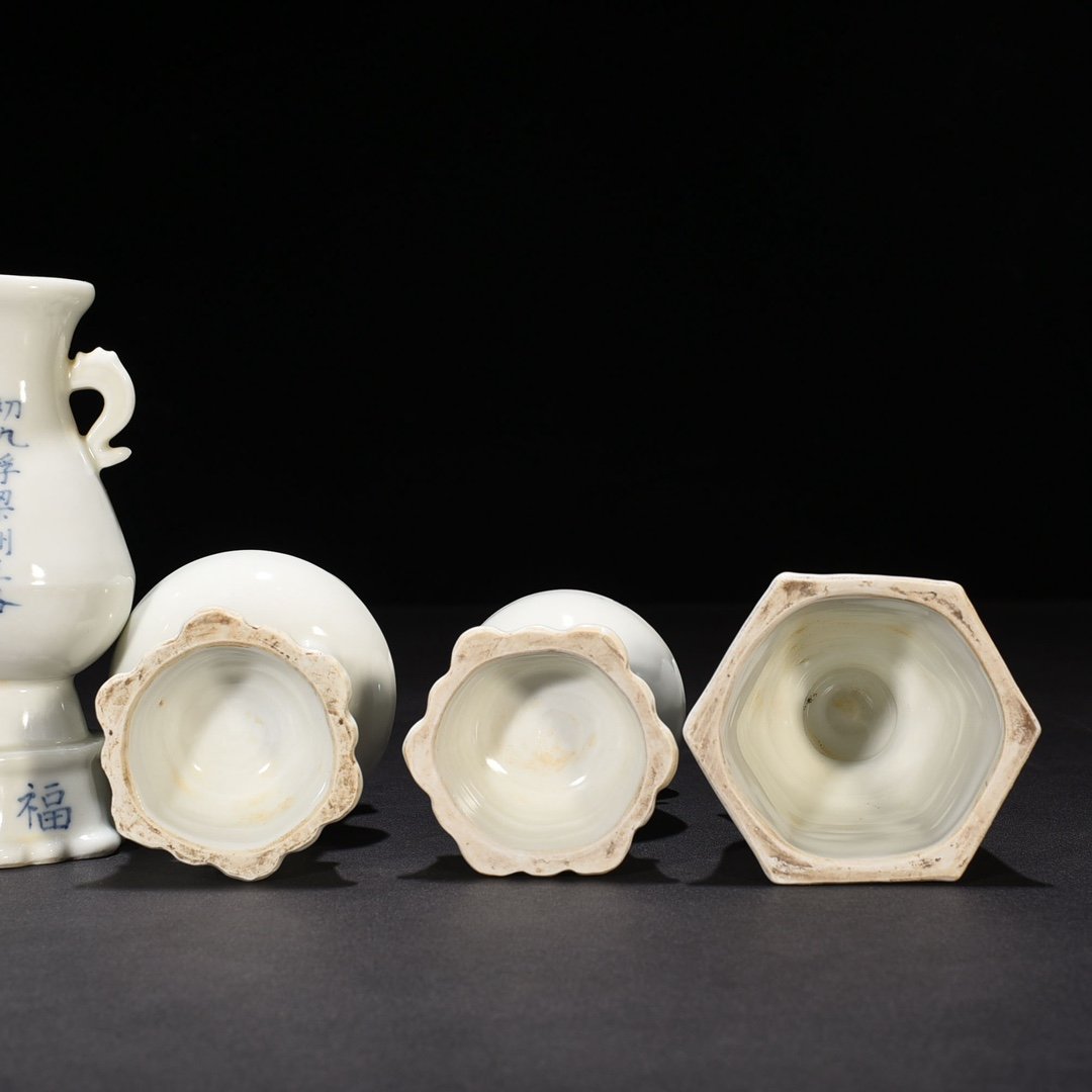 Ming Dynasty Yongle ninth year sweet white glaze five offerings candlestick