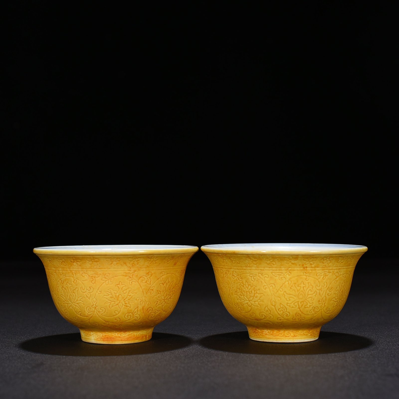 Ming Dynasty Yongle delicate yellow glaze carved lotus pressed hand cup